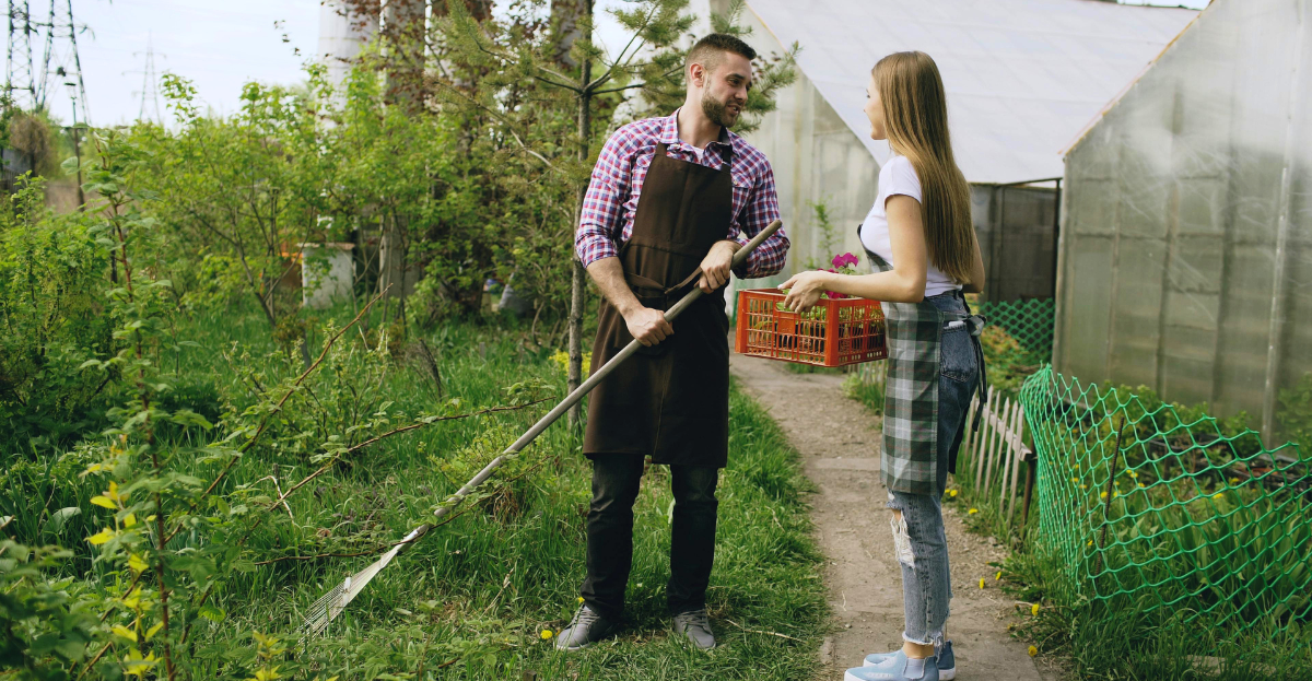 Two people talking at allotment